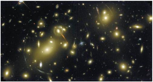 Gravitational lensing of distant galaxies by a closer galactic cluster. Observed by Hubble Space Telescope.